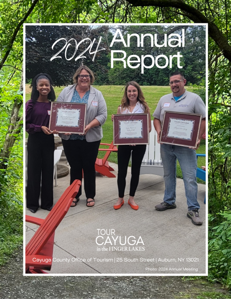 Annual Report cover 2024 showing four partners showing off their awards