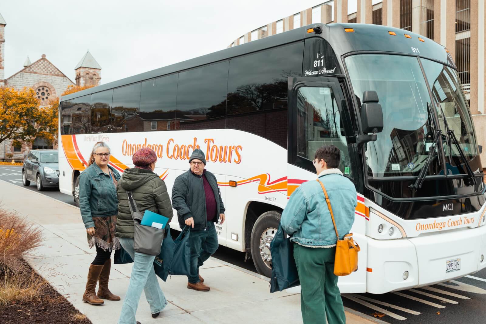 Group of People boarding a bus