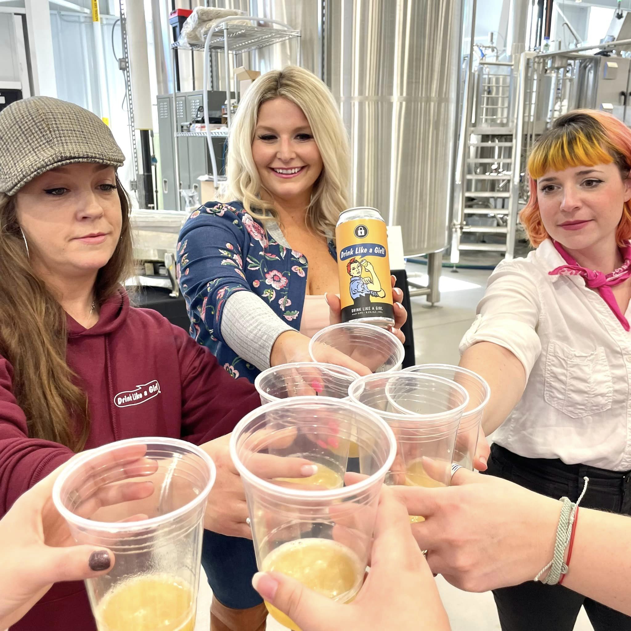 Brave Women Week, Brave Brews Festival showing three women toasting with cups of women brewed ale.