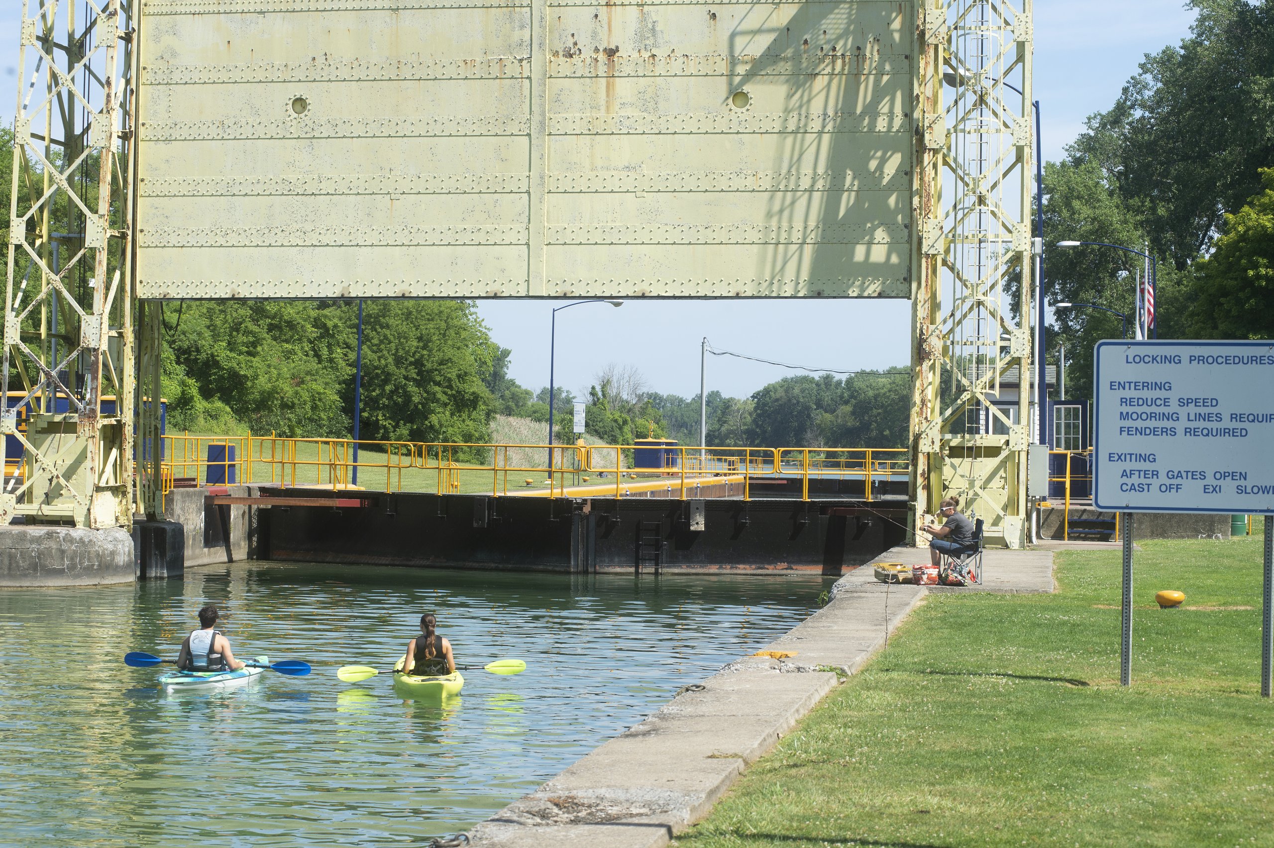 Erie Canal Bicentennial Celebration kayakers waiting for the locks to open at Cayuga Lake Mud Lockes