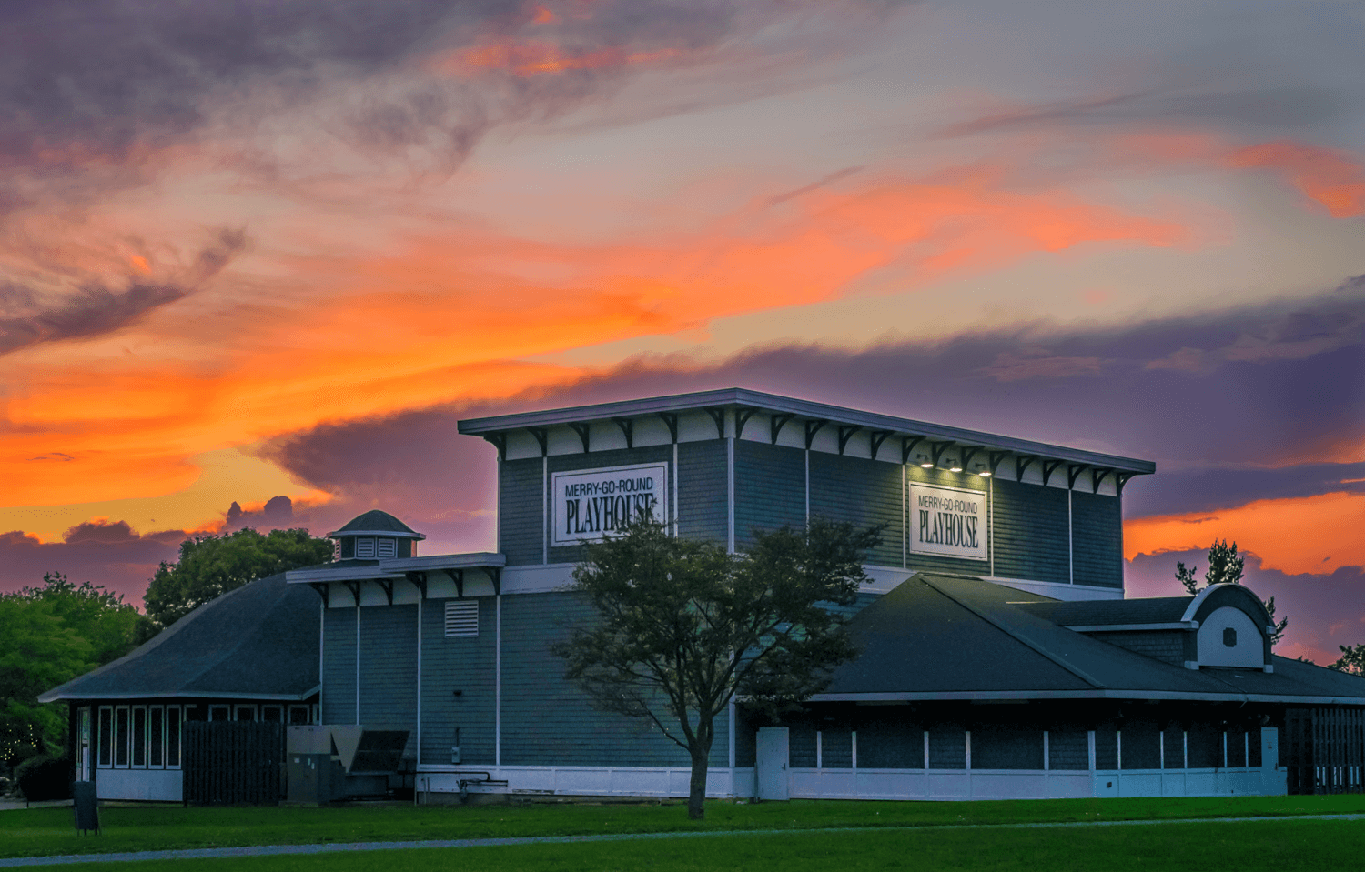 2025 Live Theatre Is Magical: Why I Believe in the Power of the Stage exterior of the Merry go round playhouse at sunset