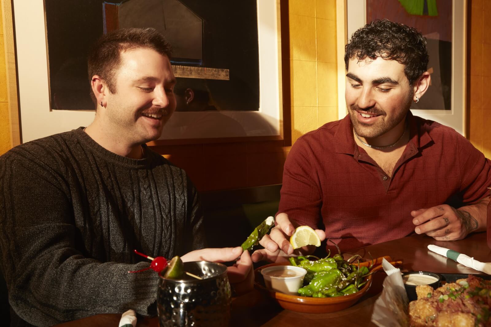 Two men enjoying a meal