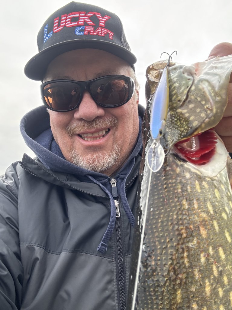 Northern Pike Fishing in Cayuga County Excels in Winter Ambassador George holding a pike