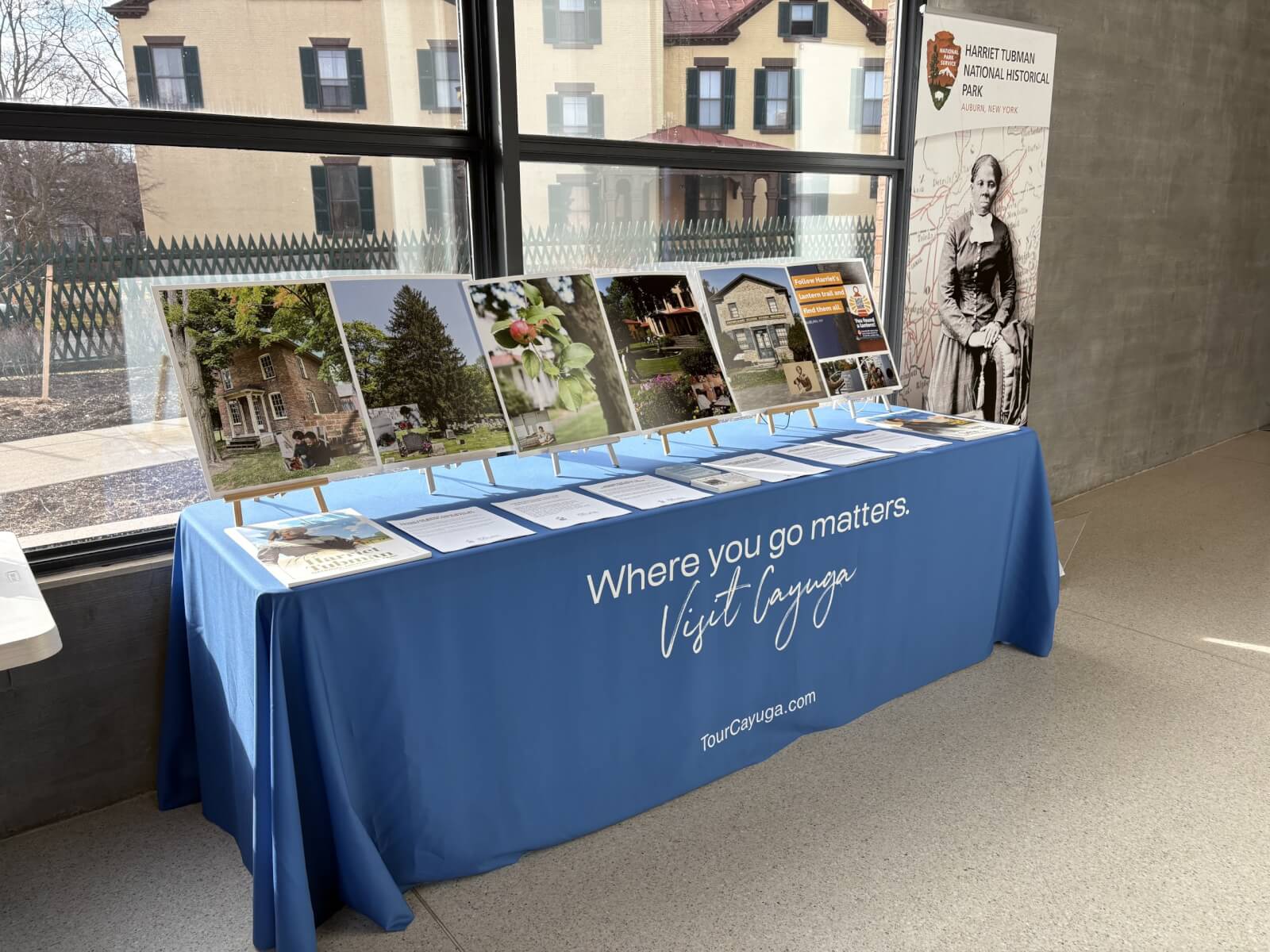 Table with posters and flyers on it about Harriet Tubman's life.