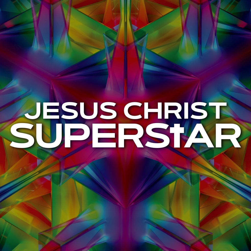 2025 Live Theatre Is Magical: Why I Believe in the Power of the Stage a colorful background with white text of Jesus Christ Superstar
