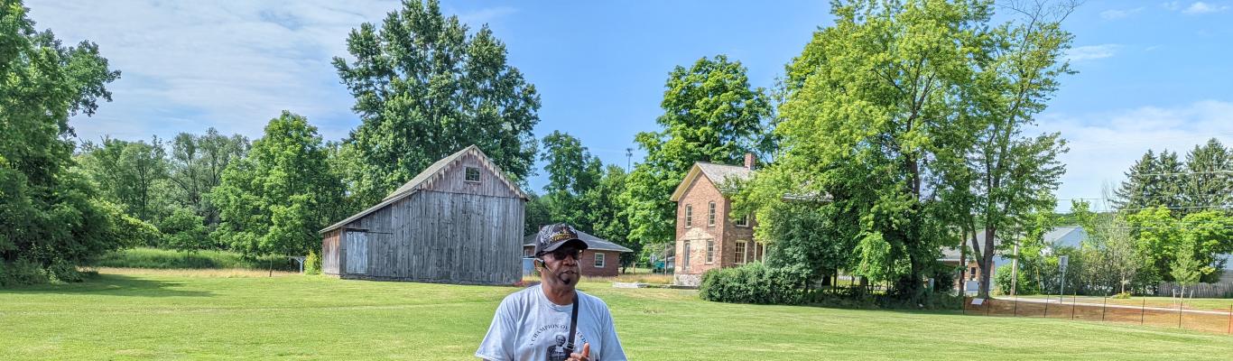 Family Friendly Outdoor Adventures in Cayuga County exterior view of the Harriet Tubman home with tour guide