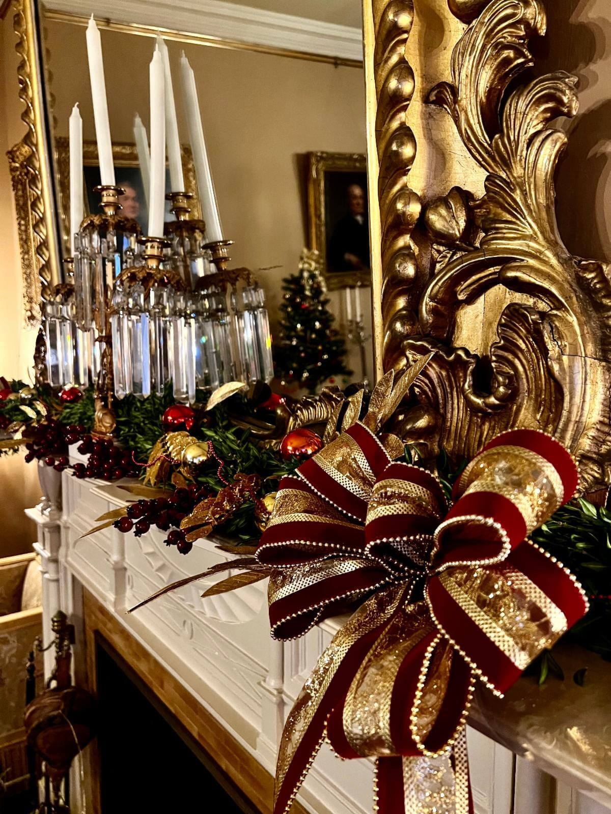Annual Events and Festivals mantel decorated with reds and golds for the Christmas holiday