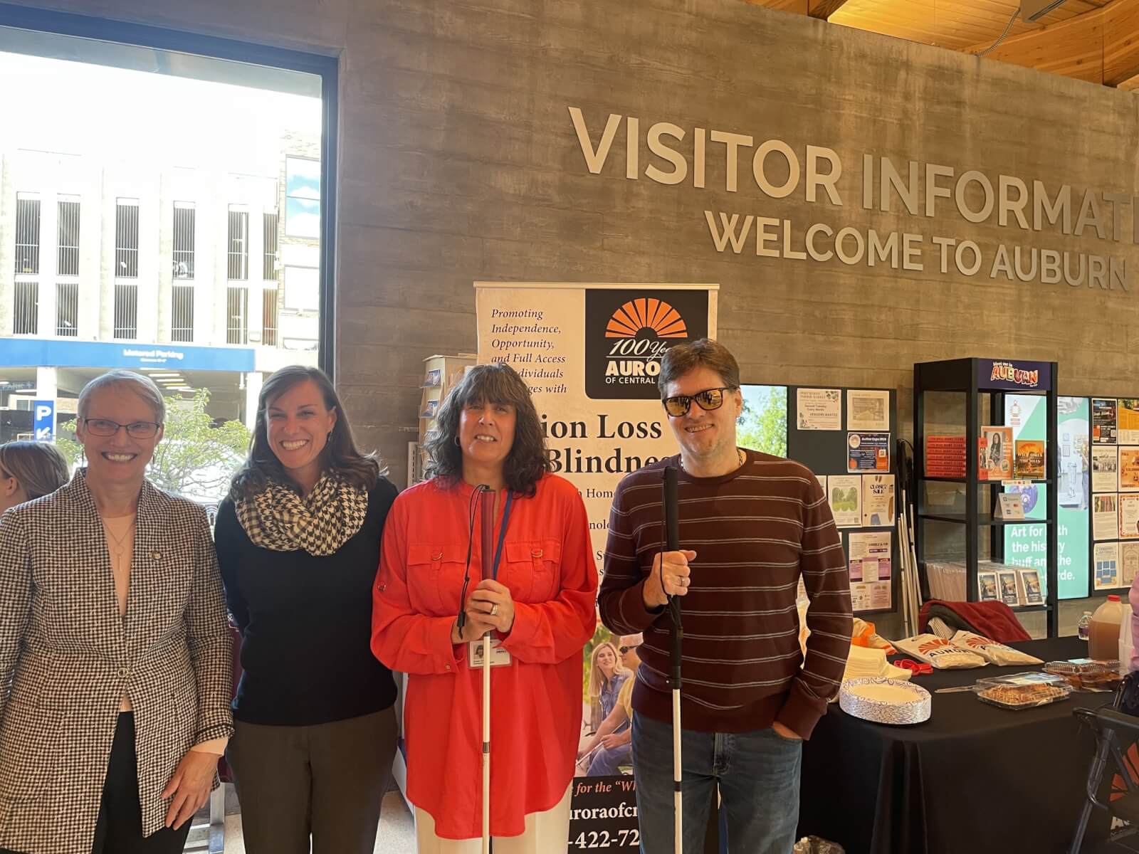 Navigating Awareness: Celebrating White Cane Awareness Day Group of 4 people gathered to honor white cane day